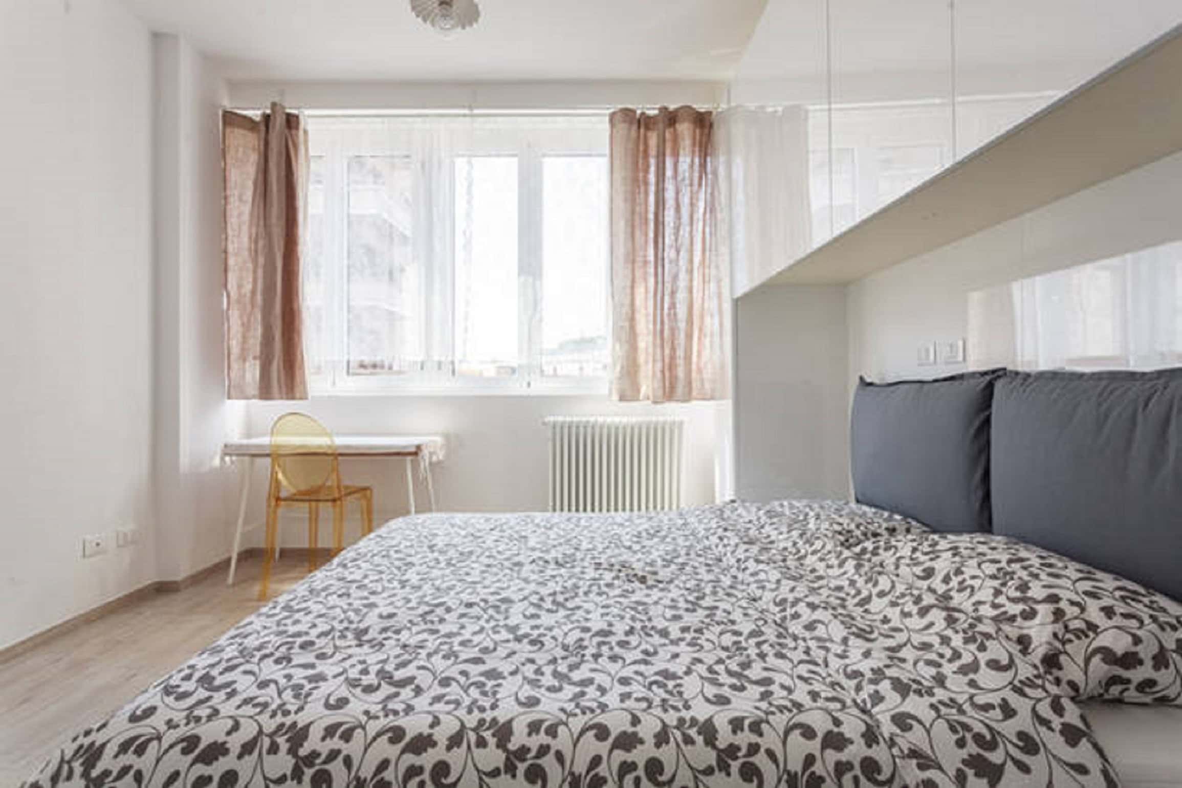 Riva Reno Apartment Cozy bedroom with natural light - Riva Reno Apartment