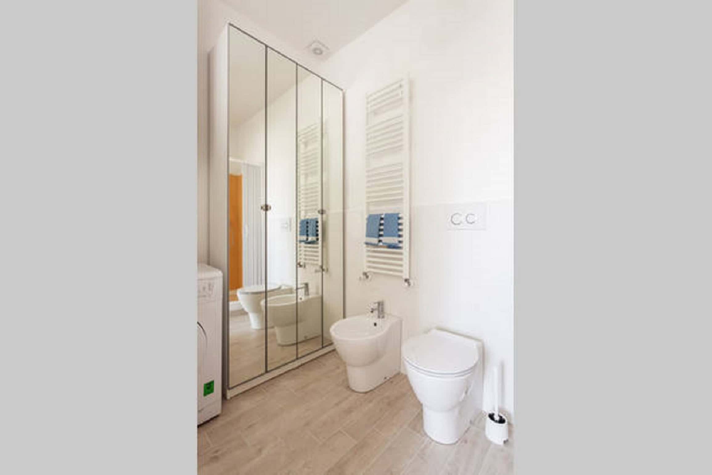 Riva Reno Apartment Modern bathroom with glass shower - Riva Reno Apartment