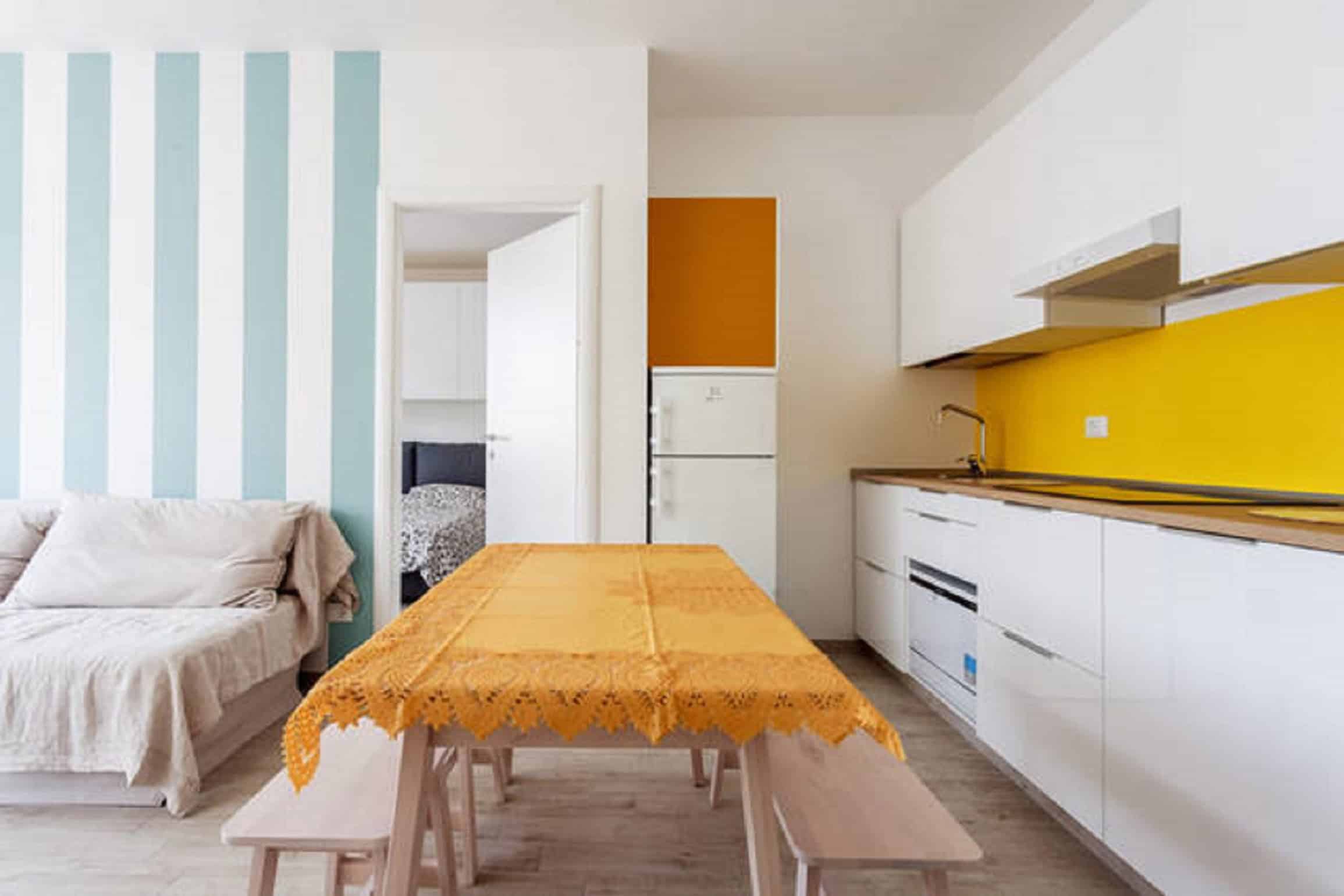 Riva Reno Apartment Modern kitchen with striped wall - Riva Reno Apartment